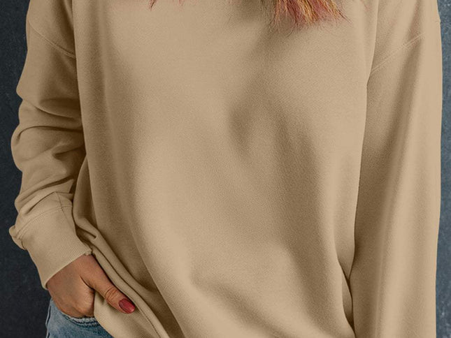 Aprikosenfarbenes, einfarbiges Sweatshirt in Übergröße mit Rundhalsausschnitt und tiefer Schulterpartie - Aurora Fashion Schweiz